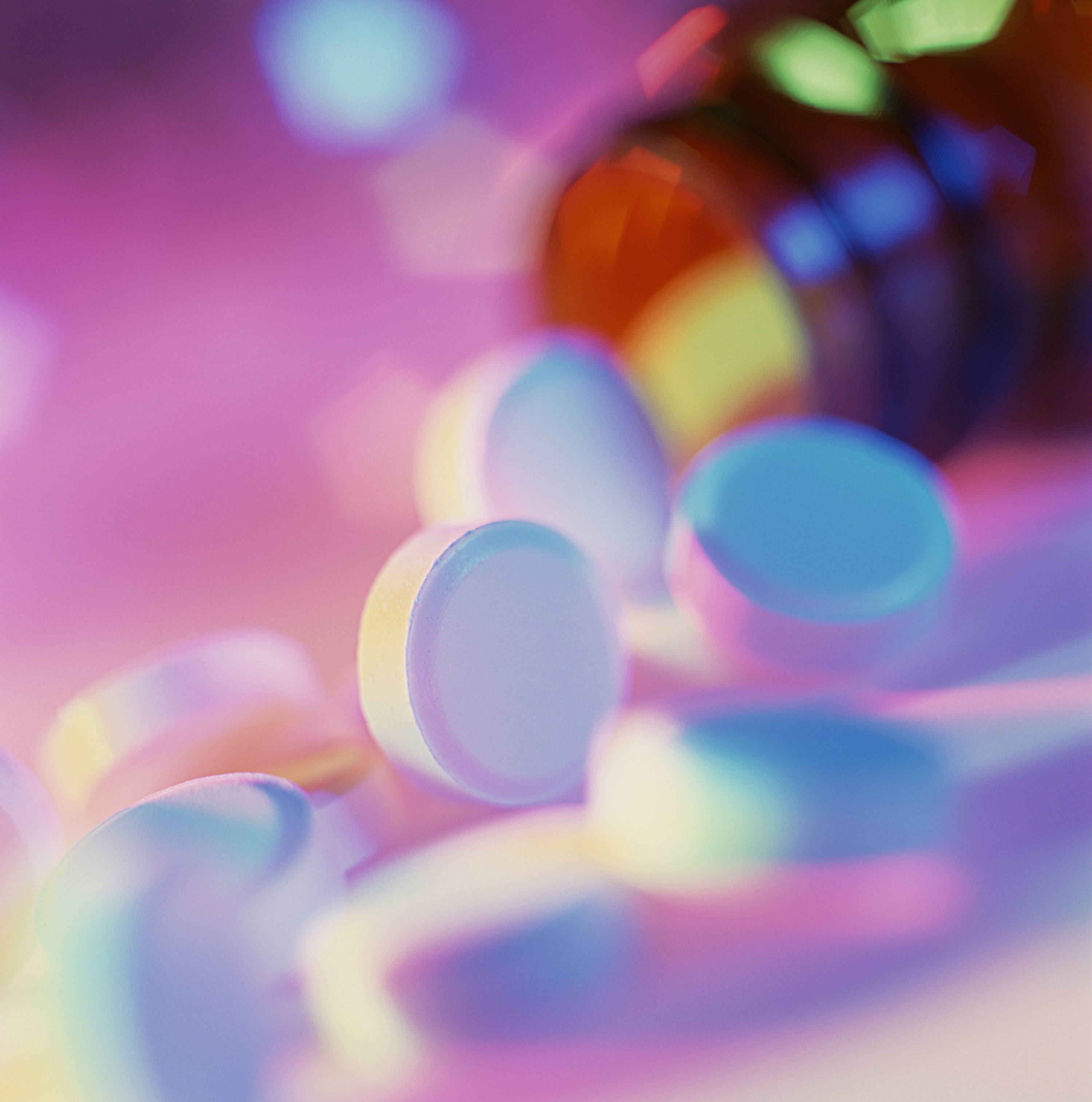 Colorful pills on a white background