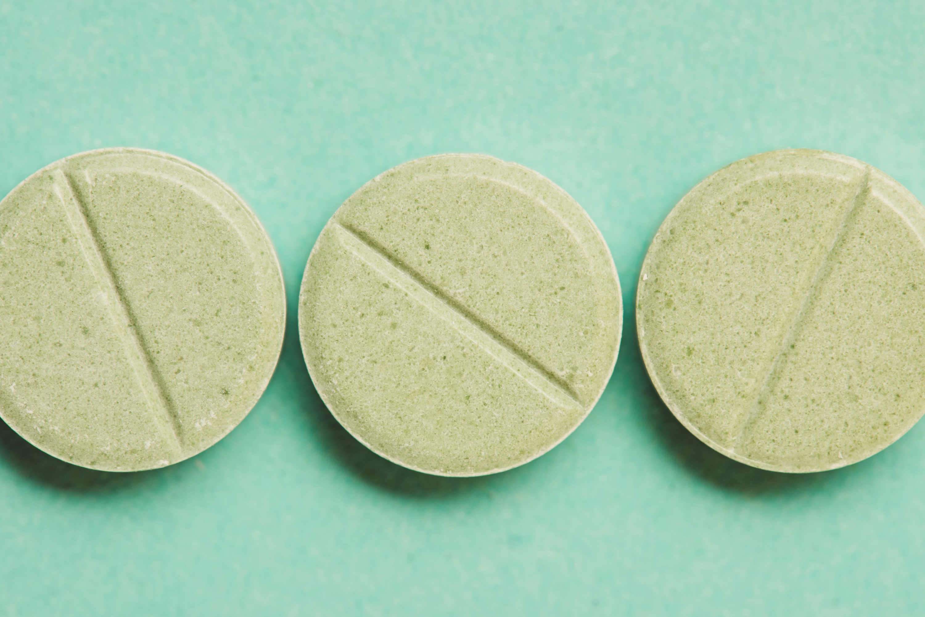 Prescription medication bottles representing finasteride treatment