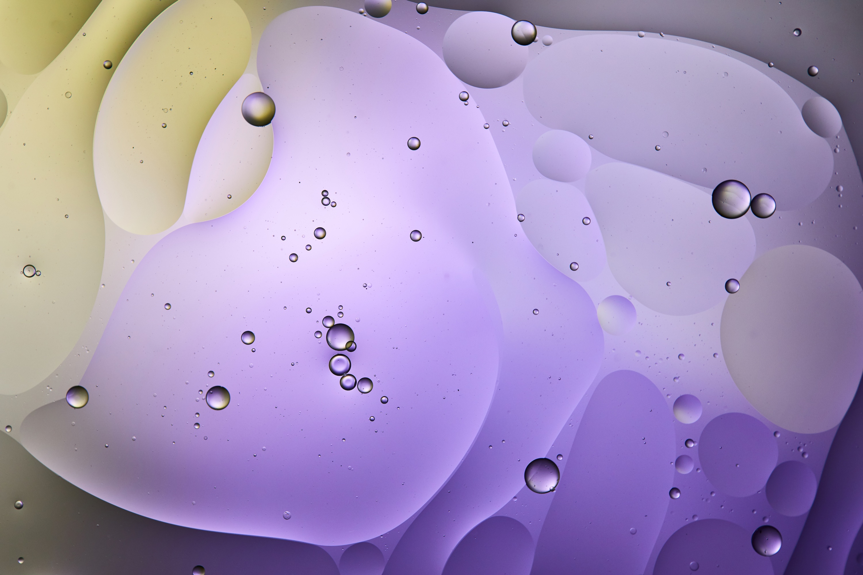 Clear viscous skincare formulation on glass surface, evoking glycerin