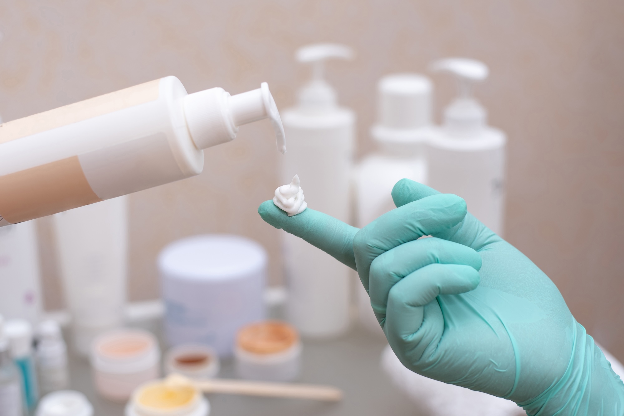 Prescription tretinoin tube alongside OTC retinol serum representing the comparison